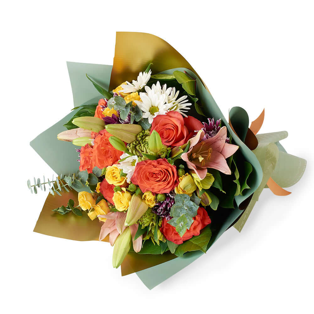 Mother's Day Deluxe Floral Wrap Bouquet with Jewel-Toned Roses and Lilies – how the gift is presented