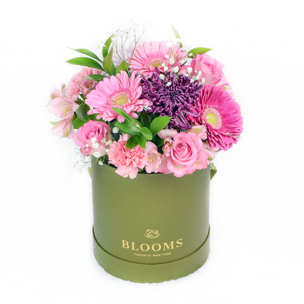Elegant Pink and Purple Mixed Flower Arrangement in Hat Box – how the gift is presented