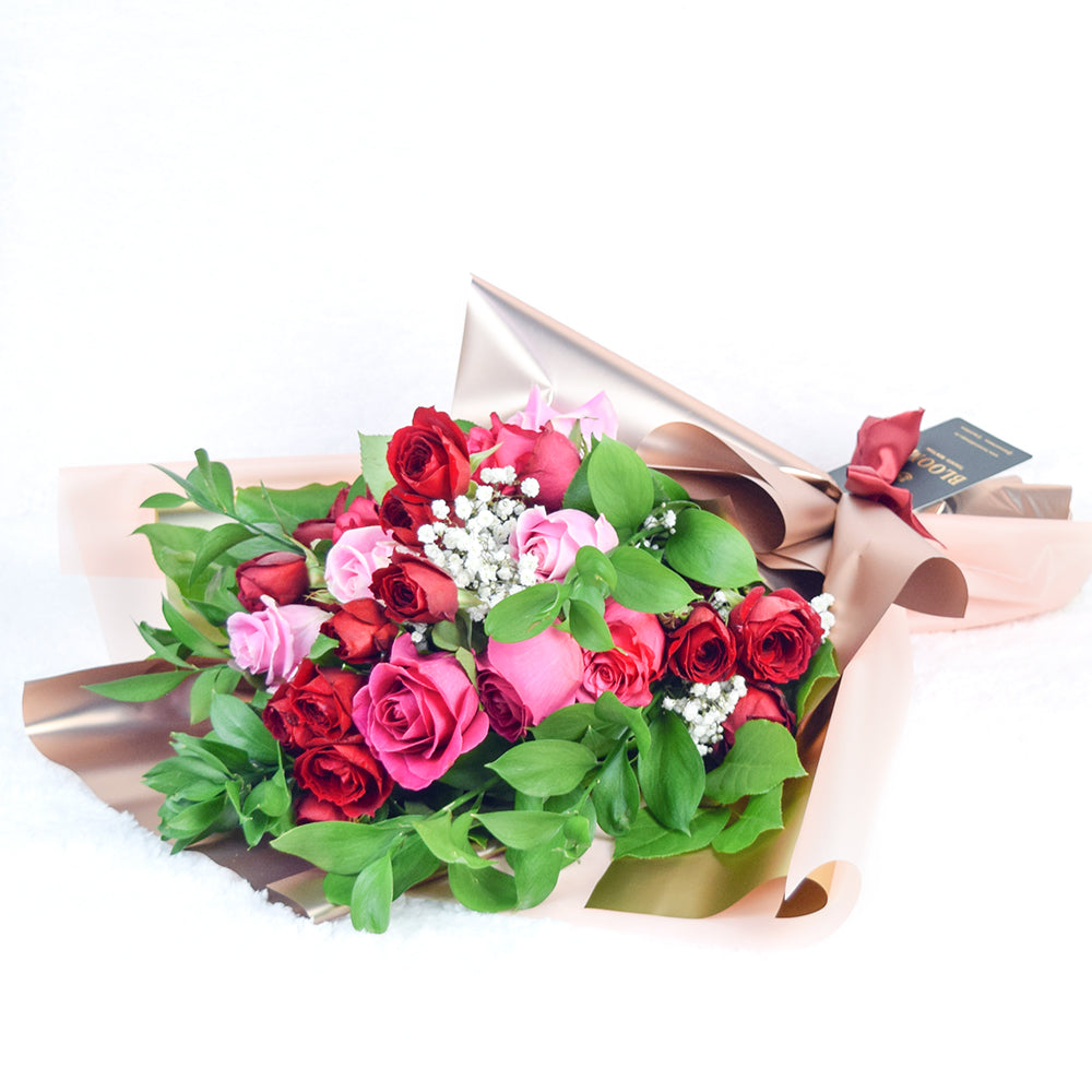 24-Stem Mixed Rose and Salal Bouquet Wrapped with Ribbon – how the gift is presented