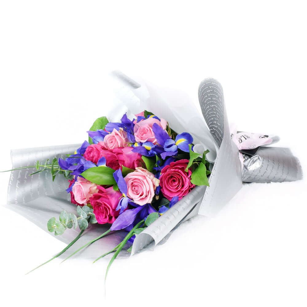 Premium Floral Wrap Bouquet with Pink Roses and Purple Irises – how the gift is presented