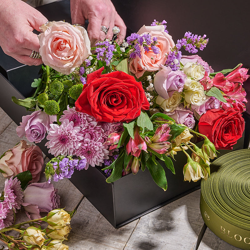 Packaged flower arrangements ready for transport