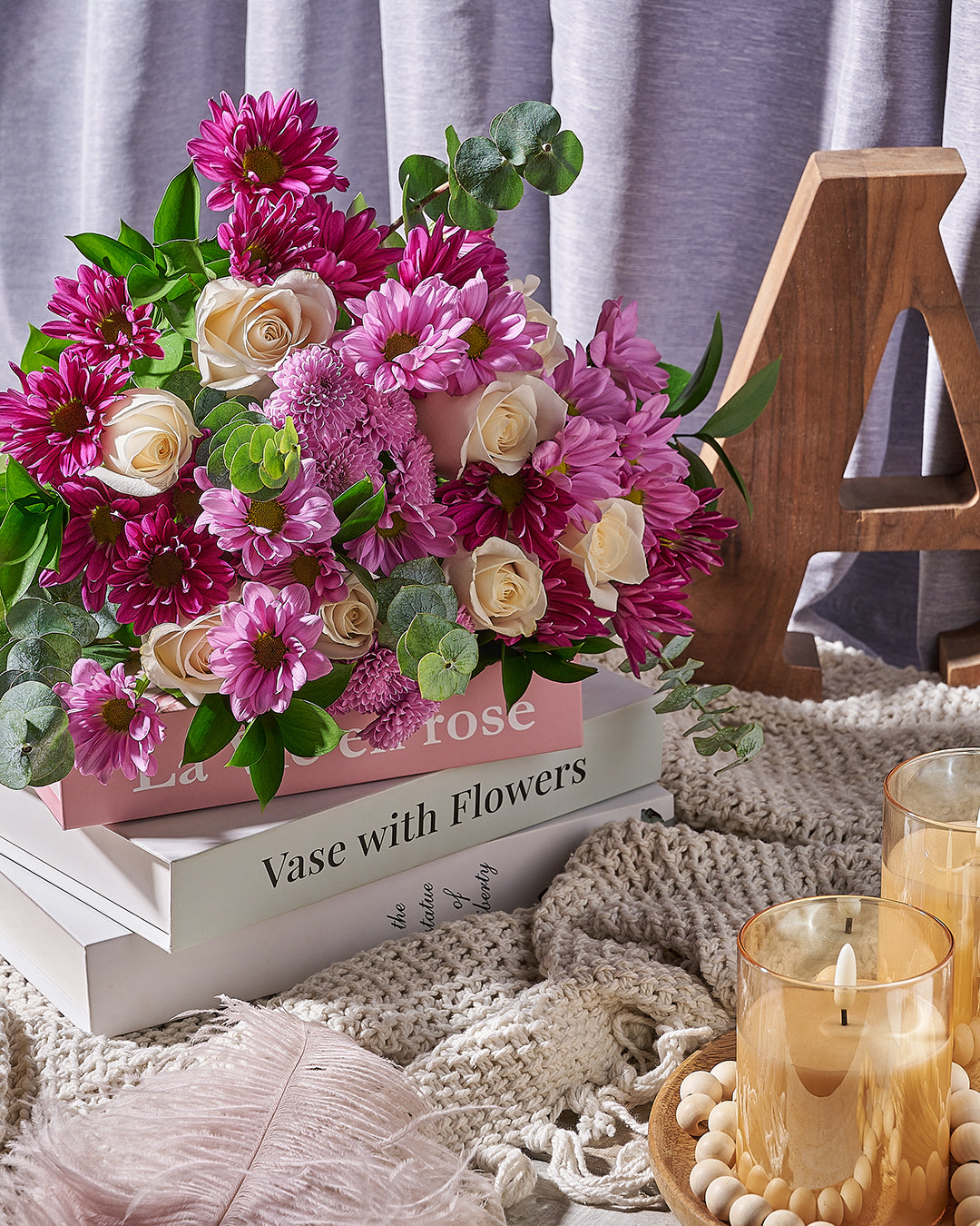 Florist preparing a flower arrangement for delivery in Los Angeles