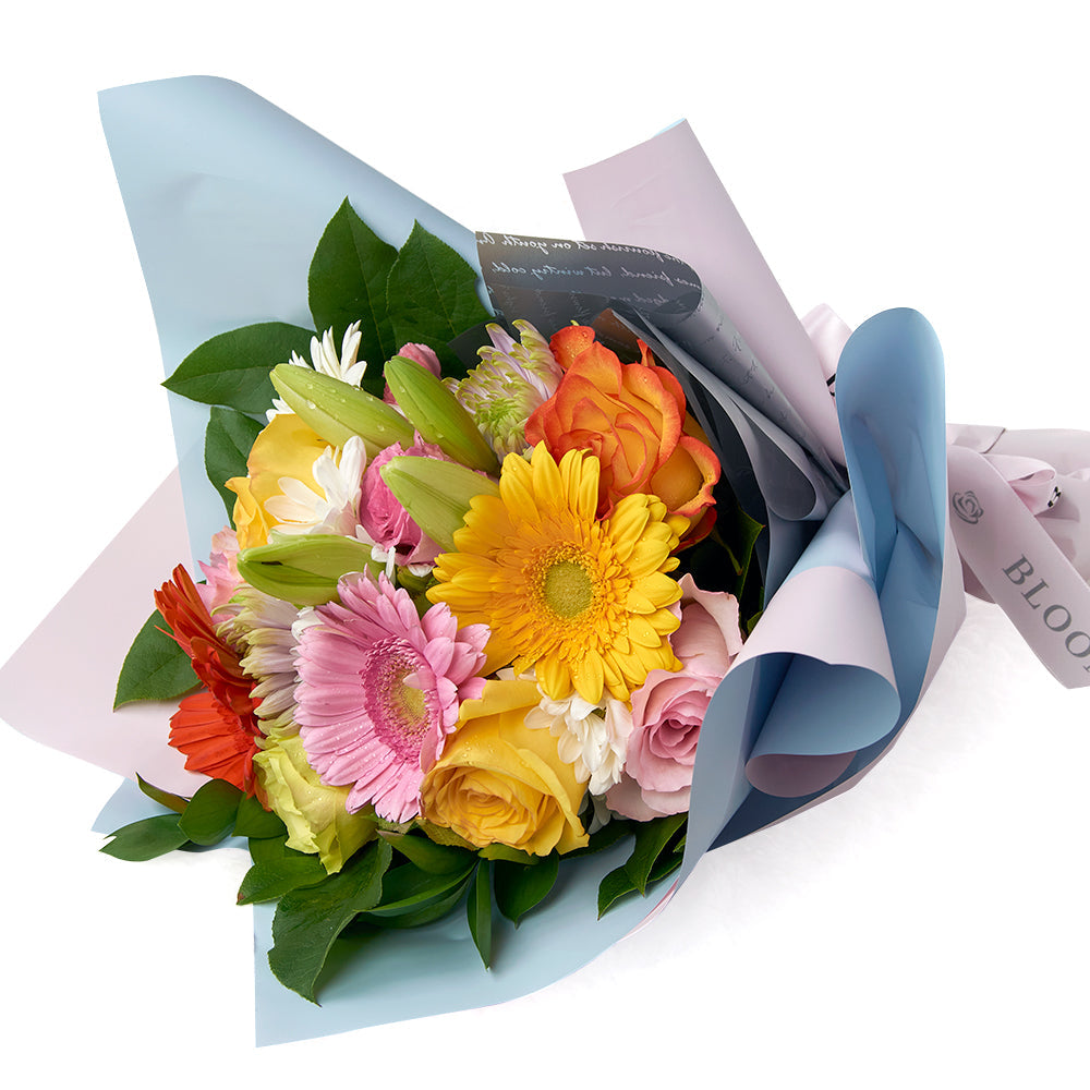 Vibrant Mixed Floral Bouquet with Gerbera Daisies and Roses – how the gift is presented