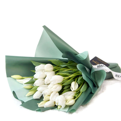 In crisp white tones, the Spring Scents Tulip Bouquet from Los Angeles Blooms symbolizes love and comfort.