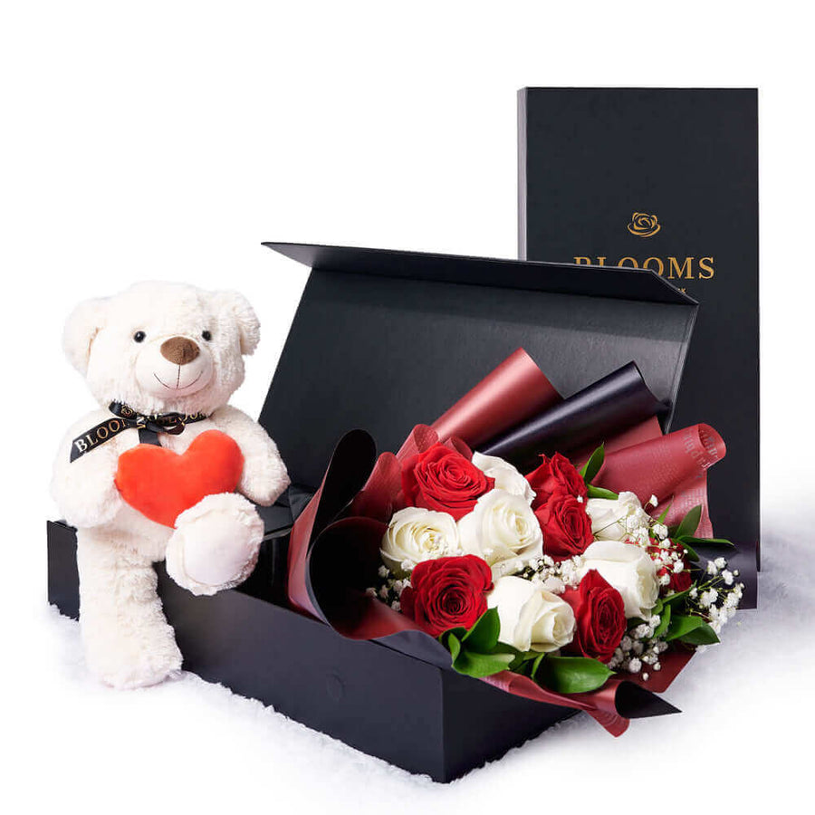 Your sweetheart will adore this cute keepsake white bear plush alongside a stunning bouquet of white and red roses on that romantic occasion. Los Angeles Blooms- Los Angeles Delivery