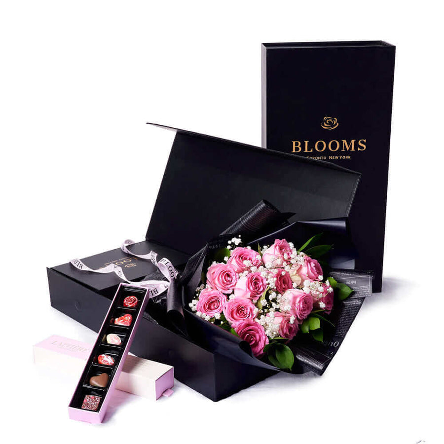 The Valentine’s Day Dozen Pink Bouquet With Box & Chocolate. Indulge your loved one's sweet tooth with some gourmet chocolates alongside a stunning bouquet of gorgeous pink roses.