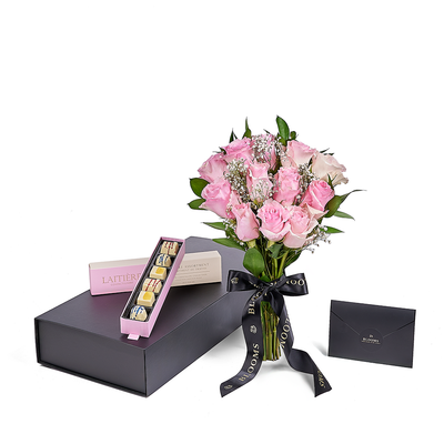 The Valentine’s Day Dozen Pink Bouquet With Box & Chocolate. Indulge your loved one's sweet tooth with some gourmet chocolates alongside a stunning bouquet of gorgeous pink roses.