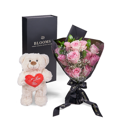 Romance should be celebrated with The Valentine’s Day 12 Stem Pink Rose Bouquet With Box & Bear. Los Angeles Blooms- Los Angeles Delivery