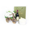 Hydragea FLower in a wooden bicycle planter. With Wine and Cake