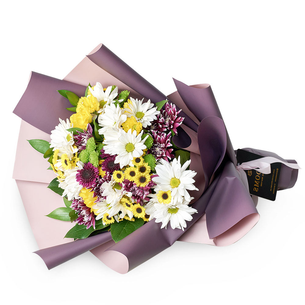 Summer Soiree Mixed Colour Daisy Bouquet Wrapped with Ribbon – how the gift is presented