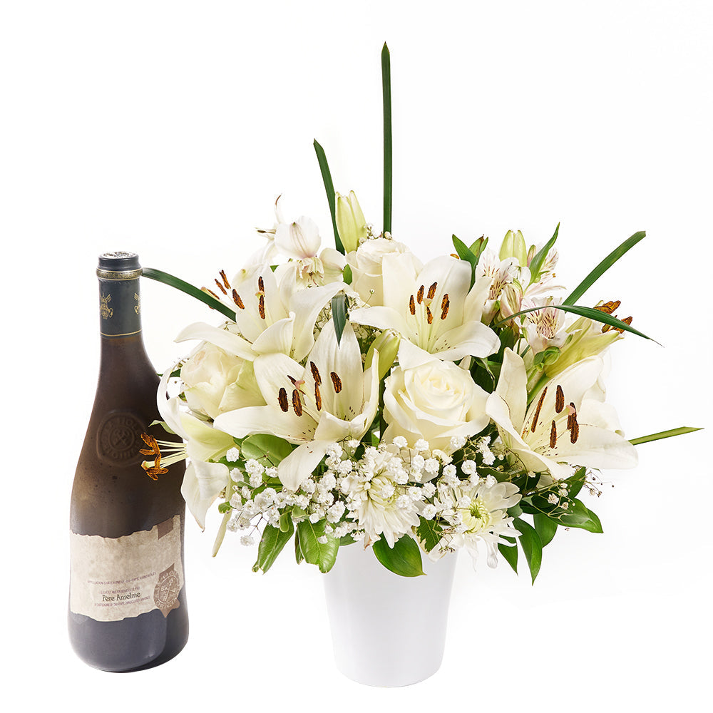 Elegant White Mixed Flowers with Included Wine Bottle – how the gift is presented