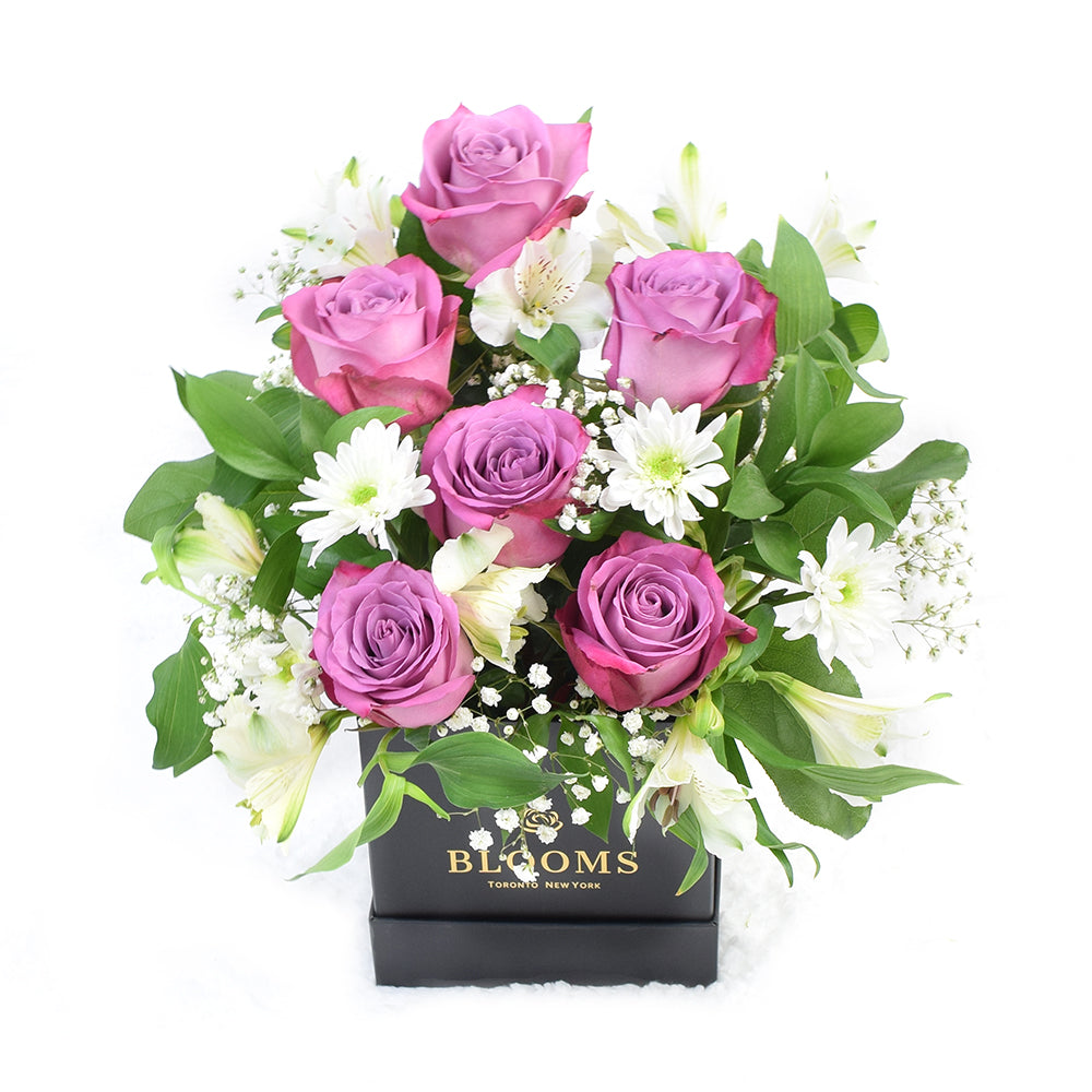 Elegant White and Purple Mixed Floral Arrangement – how the gift is presented