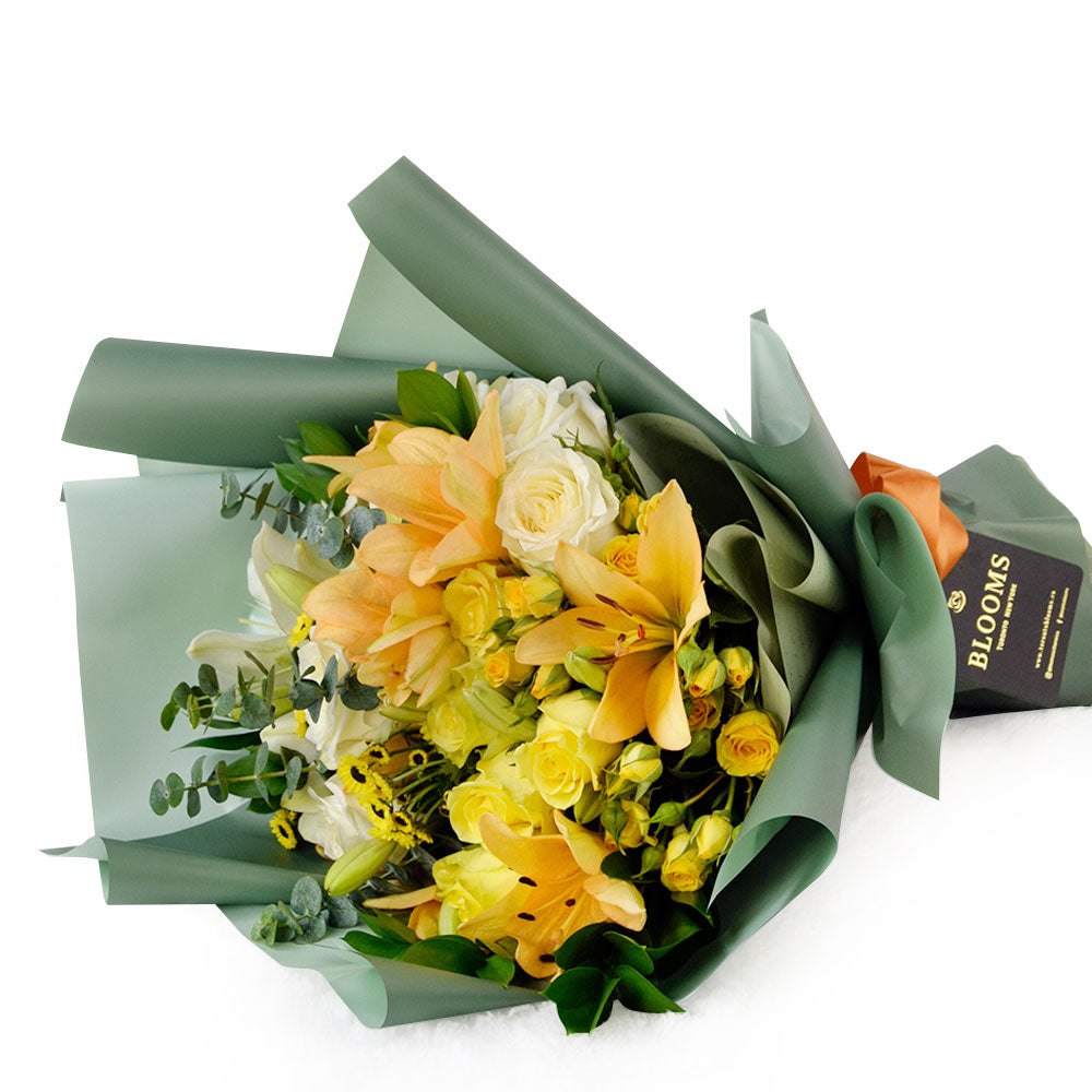 Lilies and Eucalyptus Floral Bouquet – how the gift is presented