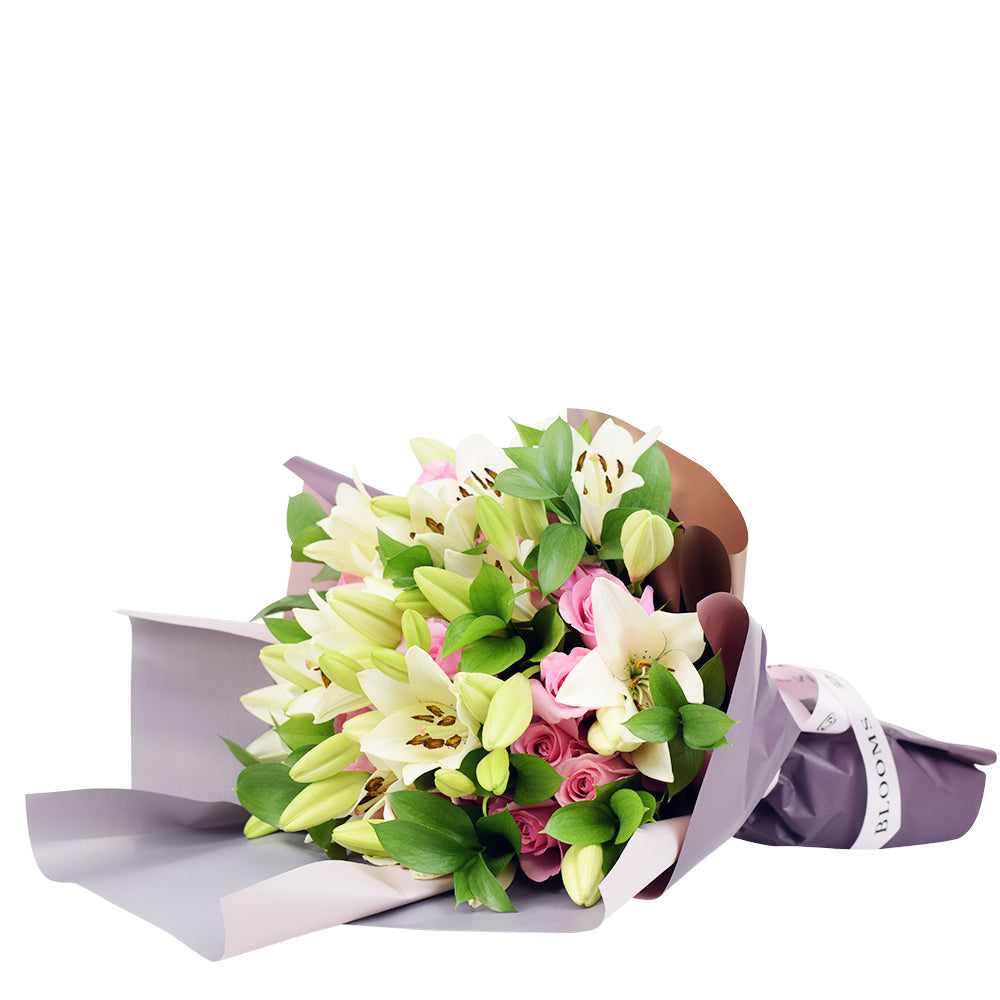 Pink Rose and Lily Wrap Bouquet – how the gift is presented
