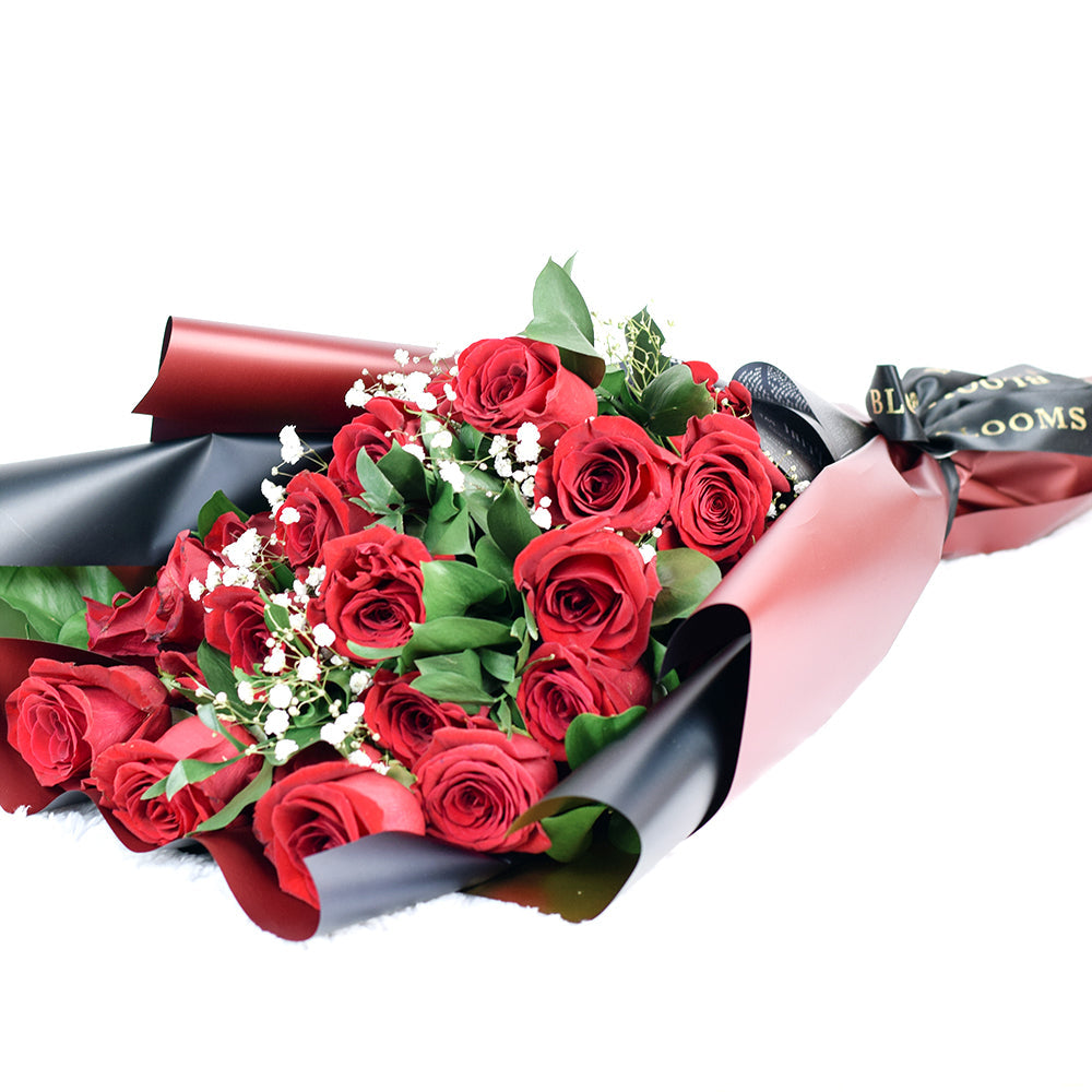 This bouquet includes a selection of deep red roses, baby’s breath, and ruscus gathered in floral wrap with designer ribbon.Los Angeles Blooms- Los Angeles Delivery