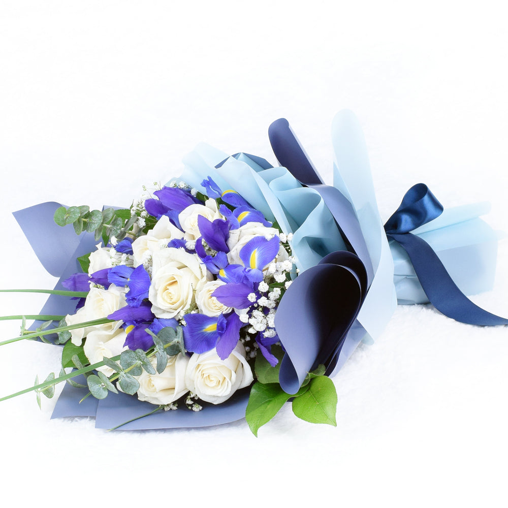 Muted Blue and White Roses with Irises Bouquet – how the gift is presented