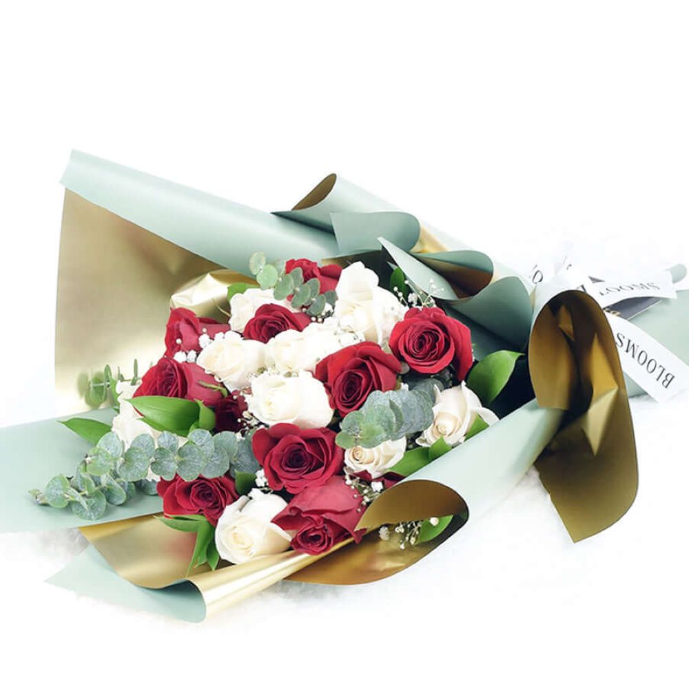 Premium 24-Stem Red & White Rose Bouquet Wrapped with Designer Ribbon – how the gift is presented