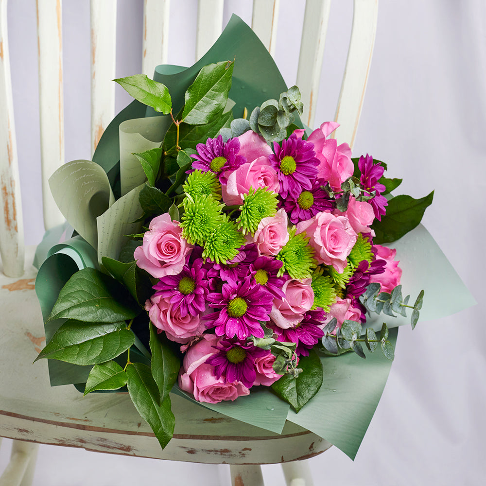 Indulge in a rich burst of colours with the Secret Garden Mixed Floral Bouquet from Los Angeles Blooms.