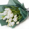 In crisp white tones, the Spring Scents Tulip Bouquet from Los Angeles Blooms symbolizes love and comfort.