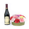 Carnation Hat Box Arrangement with wine. Los Angeles Blooms