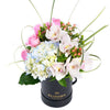 This gift highlights the beauty of hydrangeas, cymbidium orchids, roses, and more in a lovely hat box that makes a lovely centerpiece. Los Angeles Blooms-Los Angeles Delivery